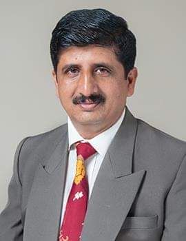 K C Devendrappa, Professor