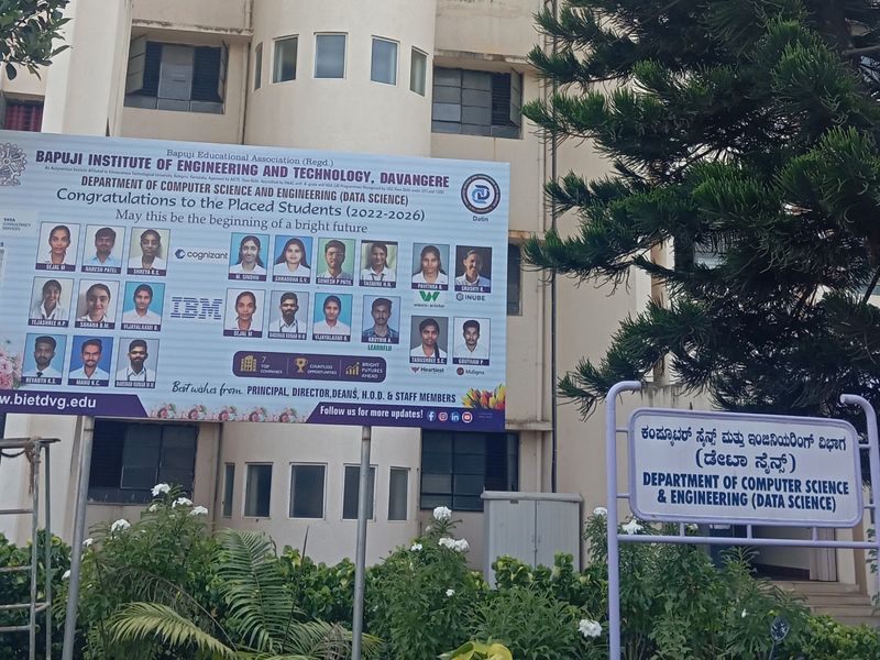 Department of Computer Science & Engineering (Data Science) building, with its signboard and a placement congratulations banner