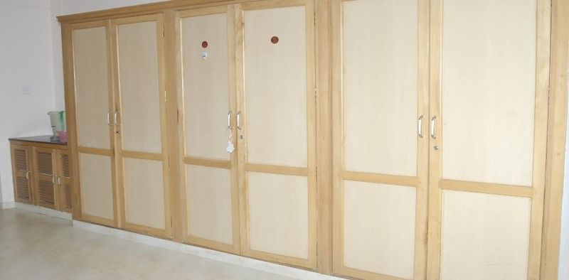 Built-in wardrobes in a hostel room