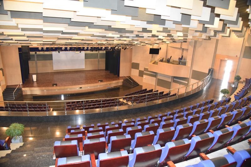 The auditorium seen from the balcony, tiered seating facing the stage